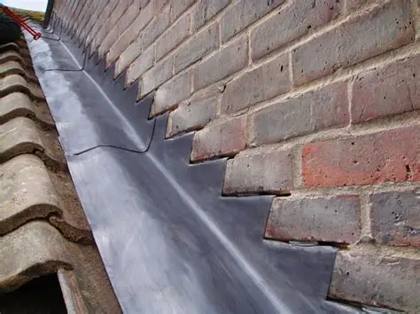 Lead step flashing installation on a Norwich roof by Luxury Roof Care Ltd
